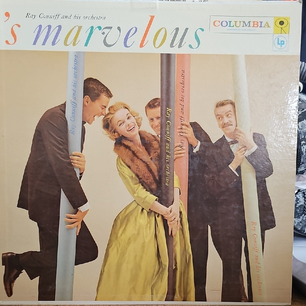 V077. Columbia 's Marvelous Vinyl Record with Colorful Cover